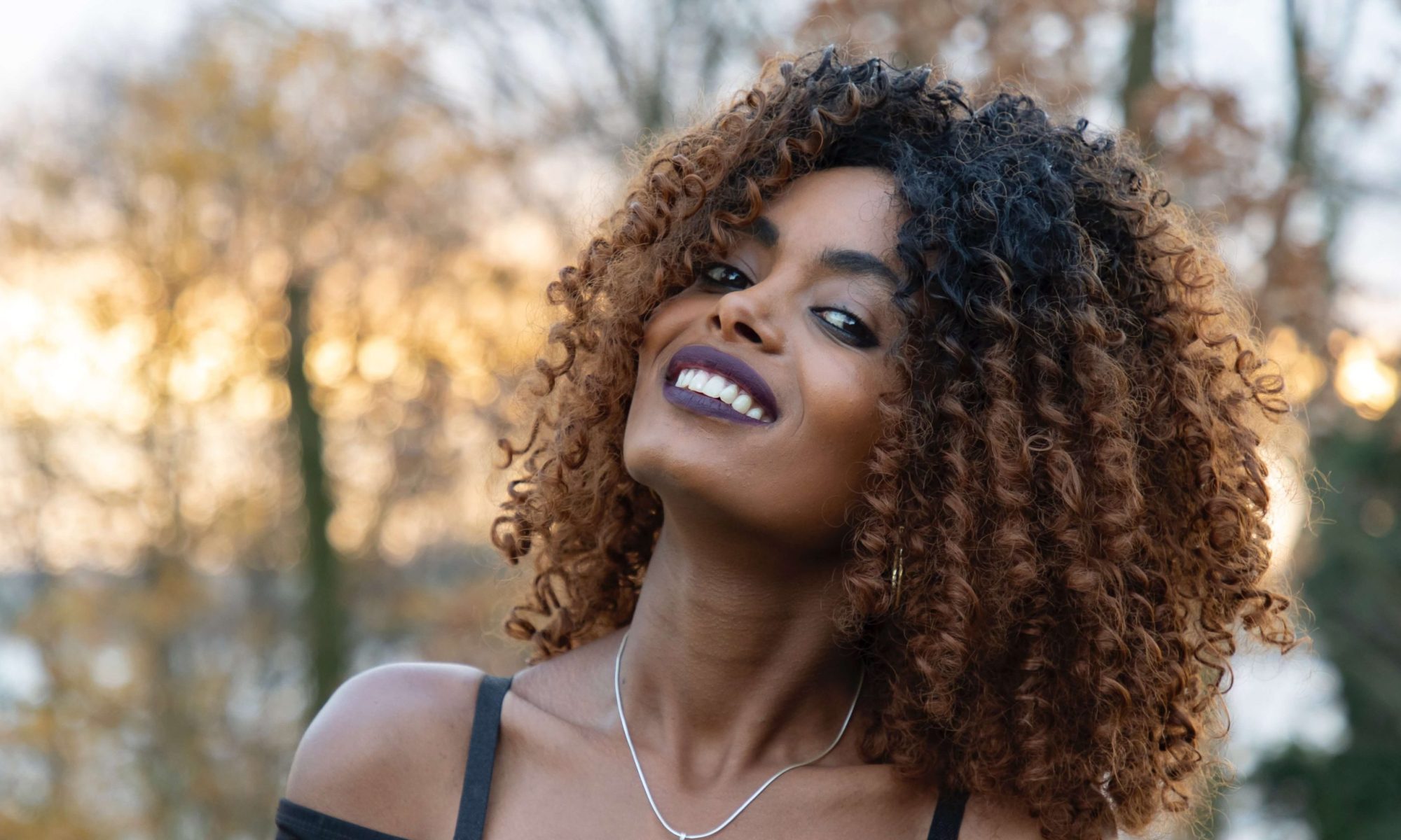 An African lady outdoors enjoying nature, Kakena Africa